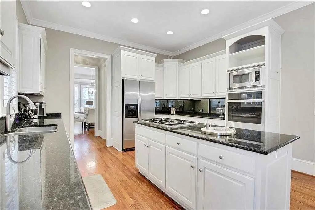 White kitchen cabinet door update with island